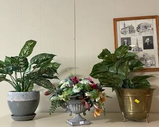 Pots with artificial flowers.