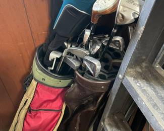 Golf clubs and bags.