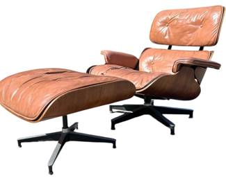 CHARLES and RAY EAMES Lounge Chair & Ottoman, model 670/671
