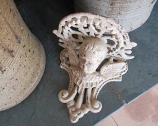 Cast iron wall sconce