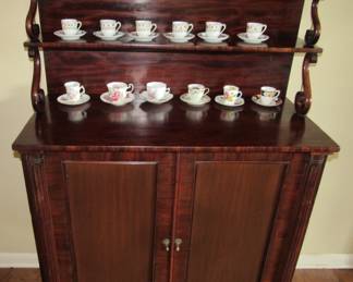 Beautiful antique hutch with brass gallery at the top