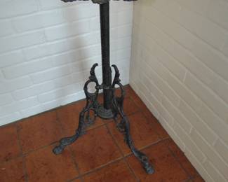 Antique iron plant stand