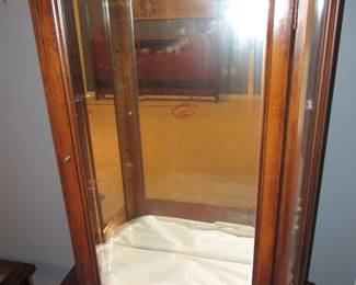 Mirrored hanging cabinet with glass shelves