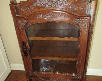 Carved wood cabinet about 3ft. tall