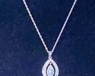 14K NECKLACE WITH DIAMOND PENDANT.