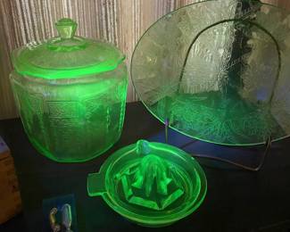 WE DID FIND A FEW PIECES OF VASELINE GLASS.