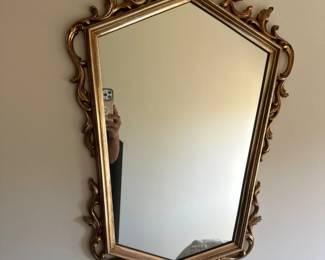 Gold wall mirror