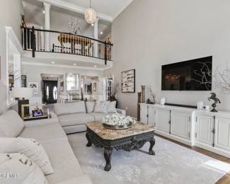 4.  2 RH Sofas with extended depth $2800.00 each, Marble Top Coffee Table (Huffman Koos) $550.00 and End Tables (2)  $300.00 each