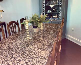 Marble top, dining  table. 7' x 3 '   unique  legs with hidden rollers for easy mobility. 