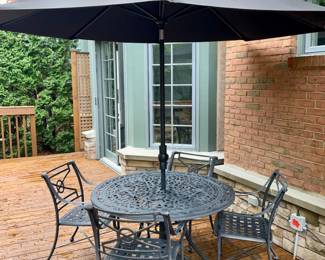 Patio table,  4 chairs, umbrella and stand . Excellent condition