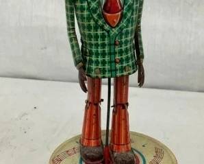 1950'S 10" BATTERY OP JIGGER TOY