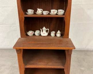 CHILDS STEPBACK CUPBOARD W/ TEA SET