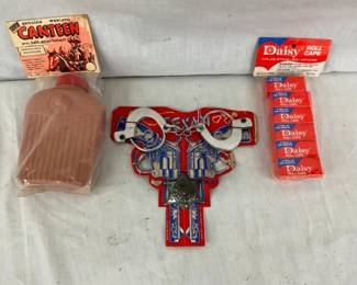 OLD STOCK DAISY CAPS,CANTEEN,HANDCUFFS