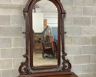 CLOSEUP W/ MIRROR AND CARVINGS