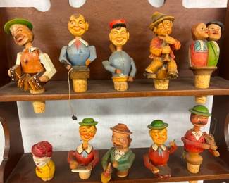 FIGURAL CARVED CORK STOPPERS
