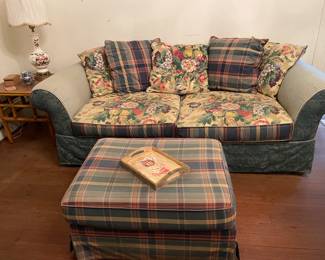 Plaid and floral sofa with ottoman