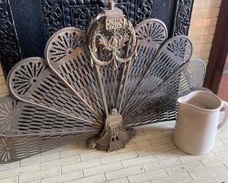 Folding brass fireplace screen