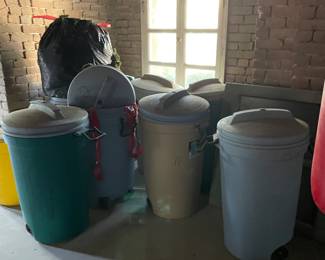 Several Rubbermade Trash Cans 