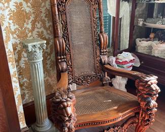 The Kings Chair, carved Lions head, Cane seat and Back. 
