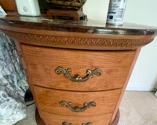 pair of night stands with faux marble tops