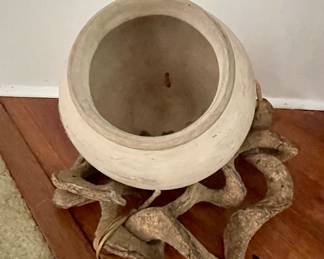 unique large pot with wood base