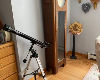 Grandfather Clock to telescope. Many decor items through the house