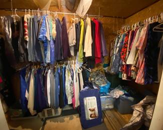 Cedar closet full of clothing item jackets to blouses to dress wear. 