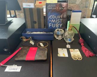 Fendi Address Book, Swarovski Stardust Bracelet, Coach Khaki Pink & Ruby Wristlet, A Court of Mist and Fury, Ten Thousand Villages earrings, Oleg Cassini votive holder, Ten Thousand Villages bracelets Waterford Perfume Atomizer
