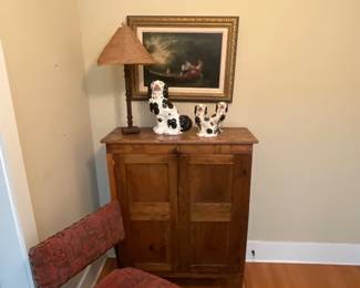 2 Authentic Staffordshire Dogs from England that are incredible, sitting on a Wonderful Antique Jelly Cabinet and A fabulous Oil on Canvas.