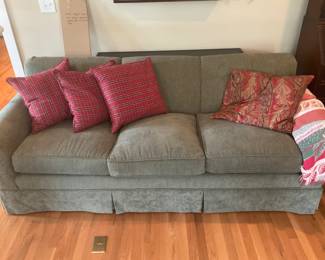 Couch / Glass Top sofa Table Behind It.