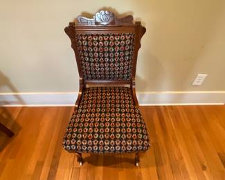 Eastlake Chair with a Modern Upholstery Finish. It will work well with any decor. 