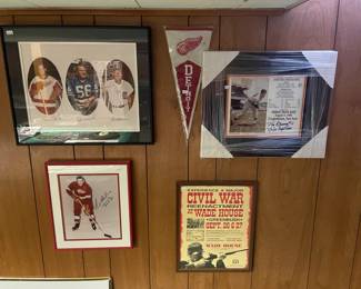 Red Wings framed art, Detroit Lions, and Detroit Tigers framed art