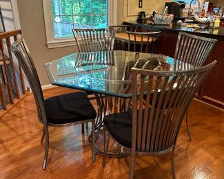 Contemporary dining set with glass top and 4 chairs