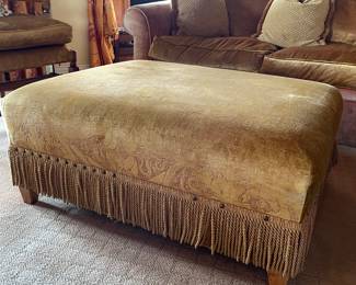 A Ruden Tassel Ottoman 