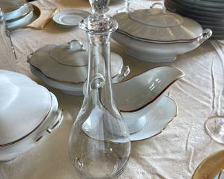 Baccarat and massive set of the finest Limoges  Porcelain with 24K gold trim.   