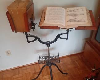 Victorian cast iron rolling book stand. Circa pre-1900