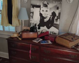 Dresser, camera and jewelry boxes.