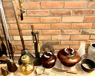 Antique collectibles, stoneware insulators, small cast iron pail (Zurn Erie on bottom), cast iron Griswold stove damper, bottle capper, etc. (SOME SOLD)