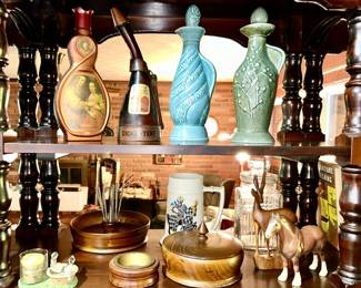 Liquor decanters (empty), wooden decor, beer mug, etc.