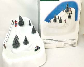 GRLI603 Dept. 56 Village Animated Ski Slope Dept 56 village animated ski slope comes with original box, two downhill skiers, tow rope, frosted trees and Ac adapter.
