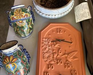 hanging pottery items and bowl