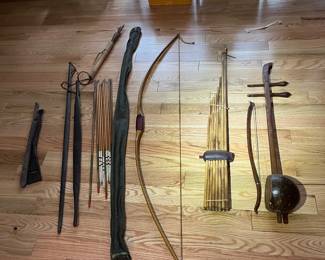 Antique musical instruments and bow and arrow sets