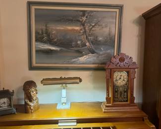 Clocks and Carved Bust of Jesus
