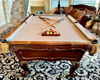 BRUNSWICK "ORLEANS" UPSCALE WOODEN POOL TABLE WITH BALLS, AND SOME STICKS.