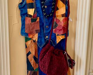 1970'S HIPPIE CHIC LEATHER PATCHWORK VEST AND JEANS.