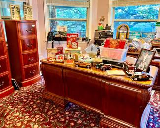 DOWNSTAIRS OFFICE WITH RECORDS, CARS, AND GAMES.