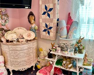 LOVE THIS SWEET CORNER, WITH WICKER TABLE, QUILT, PORCELAIN ROSE PLATTERS, AND RABBITS!