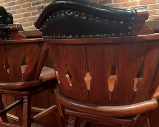 DETAIL OF LEATHER BACK BAR STOOLS