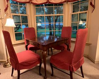 GAME TABLE WITH EXTRA LEAF (not shown) AND 4 CHAIRS