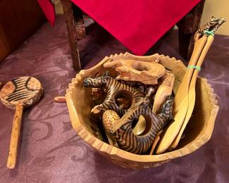 African bowl with 10 piece napkin ring set